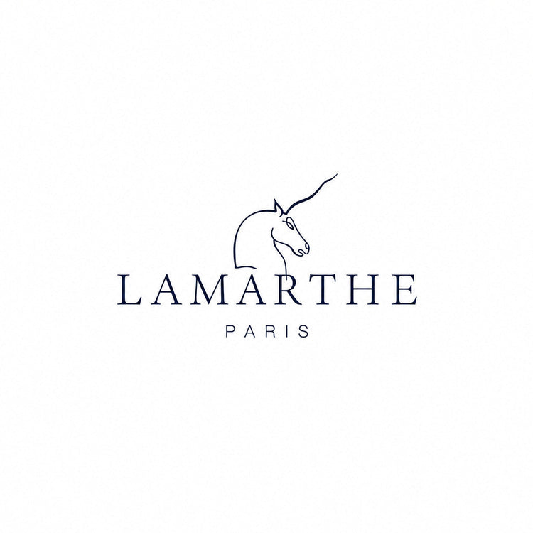 a logo with a unicorn head